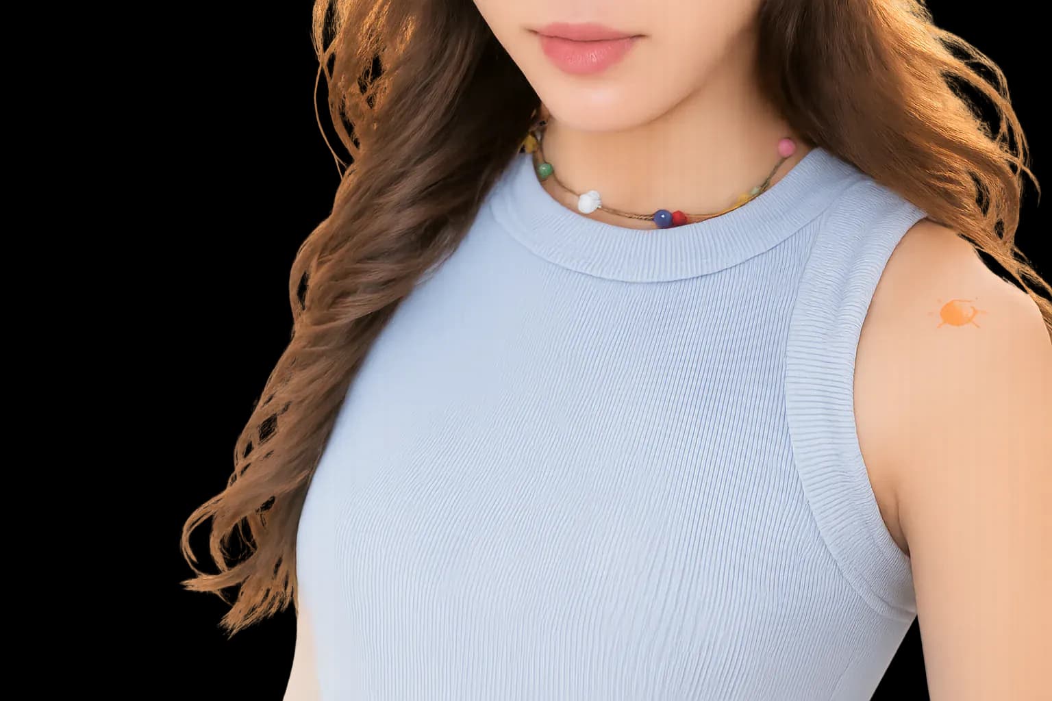 Lumoraah pebble-bead necklace worn with a soft blue tank